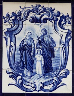 Typical Portuguese tile painting with saint motifs at the house entrances
