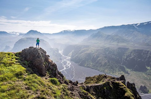 Hiker looking over landscape