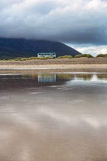 Discarded Double-decker bus in the dunes