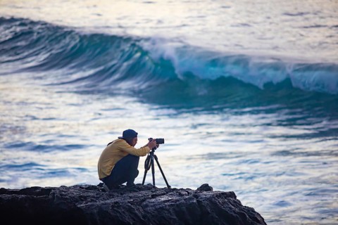 Photographer at work on the beach of Praia de Santa Barbara