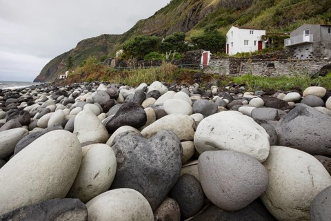 Coast with large round stones in Rocha da Relva