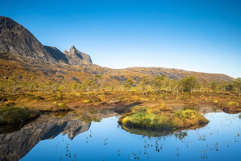 Mount Kulhornet reflected in small pond