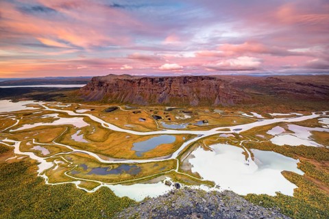 View from Skierffe mountain over the autumnal Rapadalen river delta