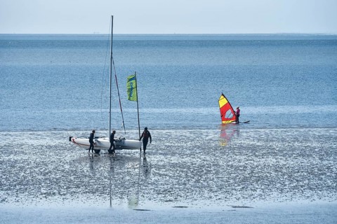 People on the edge of the Wadden Sea
