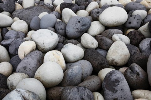 Large round stones on the coast of Rocha da Relva