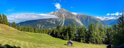 Fog band and prominent debris flow channel at Klopaierspitze
