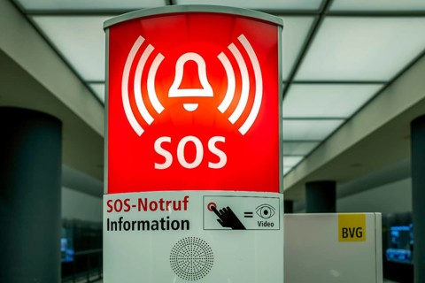 Red emergency call box at a Berlin underground station