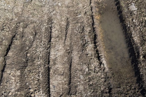 Erosion damage on an upland moor from vehicles and walkers. Swaledale