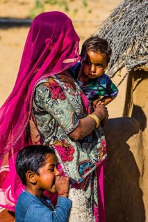 Colourfully dressed desert dwellers