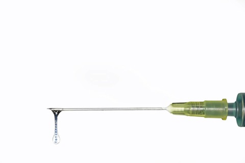 Hypodermic needle filled with inactivated vaccine