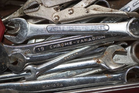 Tool box full of spanners and other tools