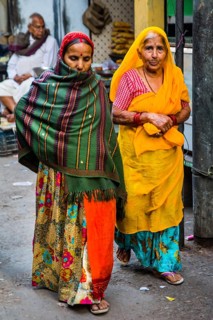 Women in colourful lehenga cholis