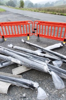 Asbestos material dumped illegally in a roadside laybye