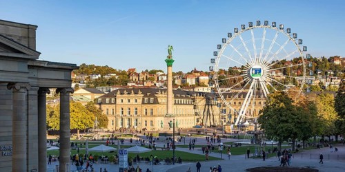 Koenigsbau and Ferris wheel in front of New Palace on Schlossplatz
