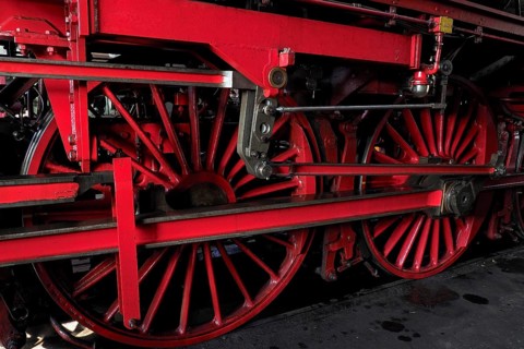 Red rail wheels of a locomotive