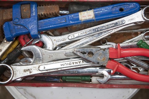 Tool box full of spanners and other tools