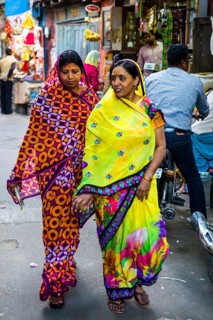 Women in colourful lehenga cholis