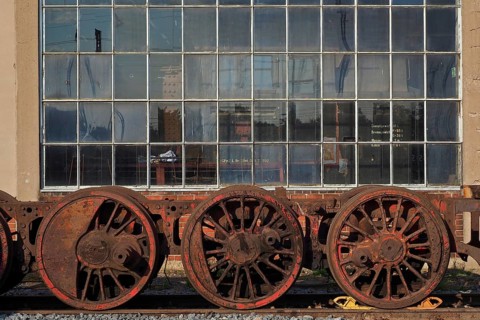 Rail wheels in front of workshop