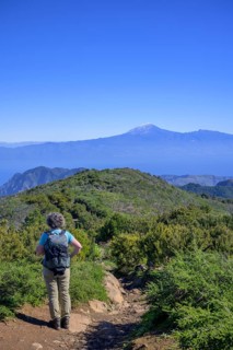 Hiking to the summit of Garajonay with Teide in the background