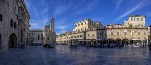 Piazza del Popolo and the Church of San Francesco on the right Loggia dei Mercanti