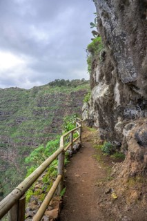 Section of path secured with wooden railing up to Mirador de Abrante