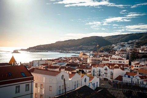 Sesimbra cityscape with historic old town and Atlantic ocean