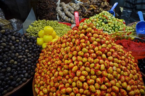 Moroccan salted lemons on mountain with varieties of olives