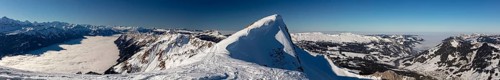 Mountain panorama with high fog over Lake Brienz