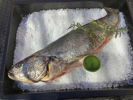 Sea bass with lime in salt crust