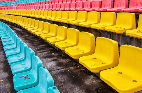 Colourful seats for the spectators at Friedrich Ludwig Jahn Sportpark