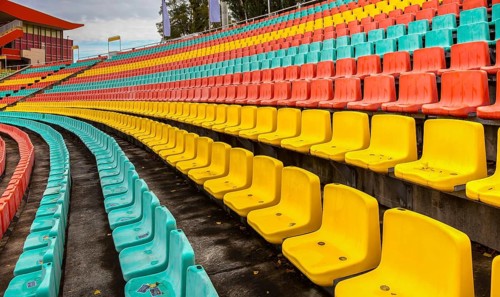 Colourful seats for the spectators at Friedrich Ludwig Jahn Sportpark