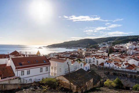 Sesimbra cityscape with historic old town and Atlantic ocean