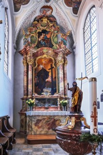 Side altar and baptismal font
