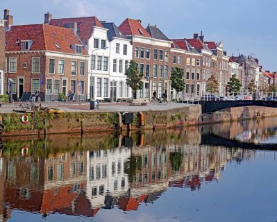 Houses reflected in the canal