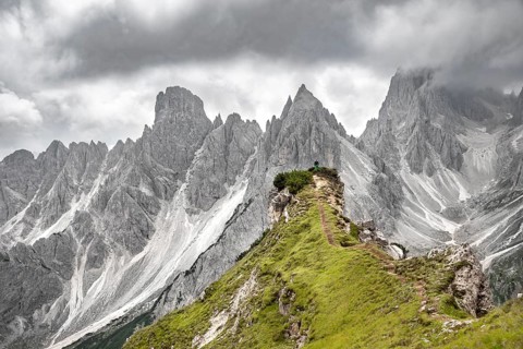 Hiker standing on a ridge