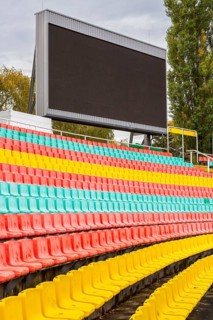 Colourful seats for the spectators at Friedrich Ludwig Jahn Sportpark