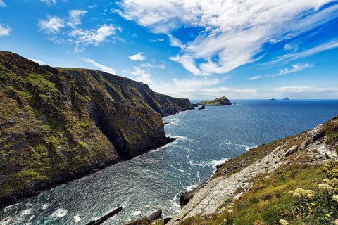 Cliffs with view of the Skellig Islands on the horizon