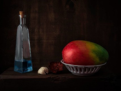 Still Life with Mango in Ceramic Basket