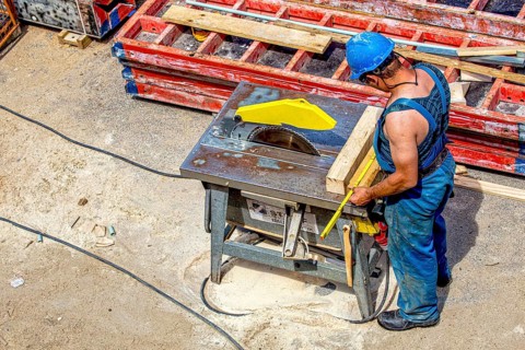 Craftsman working on a circular saw