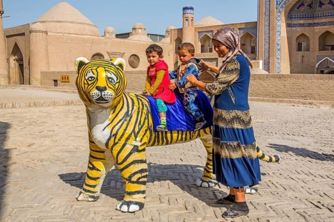 For the photographer in front of the medrese Kutluq Marad Inaq