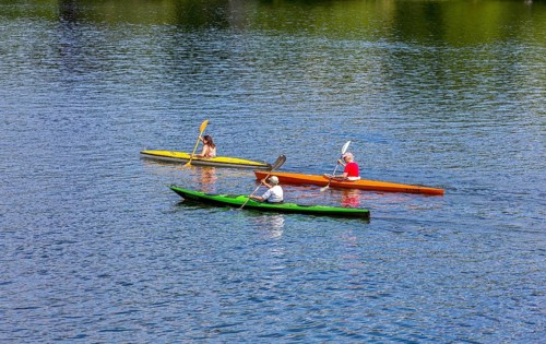 Recreational sportsmen with their kayak on the Havel