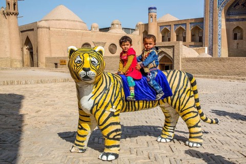For the photographer in front of the medrese Kutluq Marad Inaq