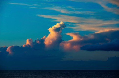 Sunset with clouds on the beach of Praia de Santa Barbara