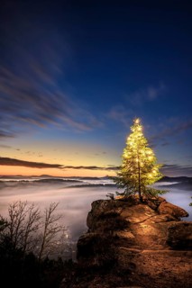 View from the sandstone rock Wachtfelsen to the sunrise