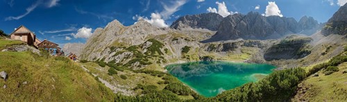 Mountain panorama with Coburger Huette and the turquoise-coloured Drachensees