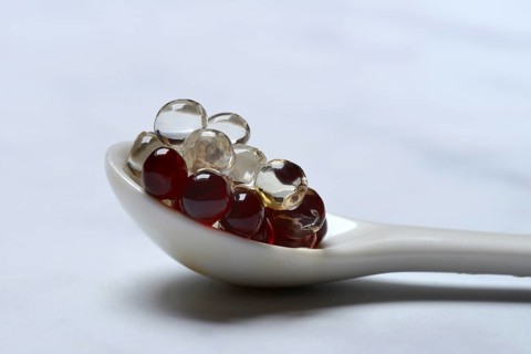 Aceto pearls in spoon