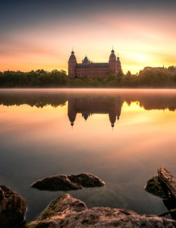 Johannisburg Castle reflected in the Main River