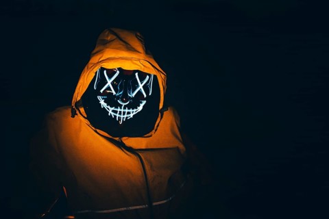 Man with Purge mask