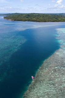 Sea level rising above reef top in tidal current channel