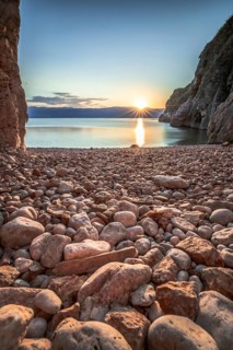 Beach of stones by the sea